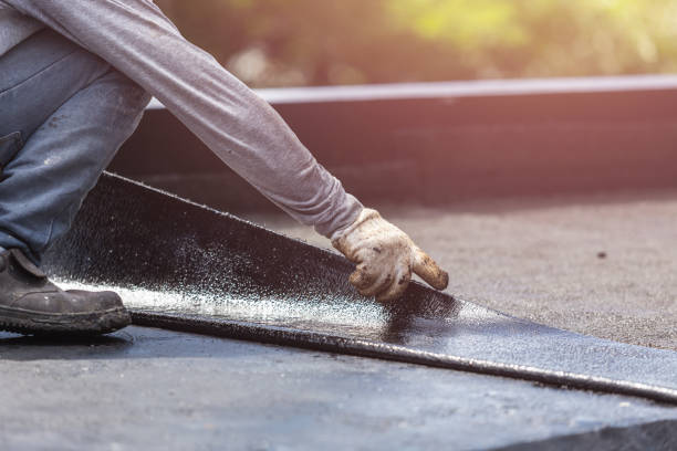 Professional Basement Waterproofing technician working in Herndon, VA